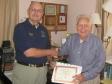 Doug Williams, WB2LEZ, West Central Fl Traffic Manager presents Woody Huddleston, K4SCL with the PSHR certificate. Woody also earned the Brass Pounders Medallion.