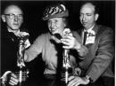 Helen Keller (center) presents the prestigious Albert Lasker Medical Research Award for 1956 to Drs Arnall Patz, W3ECV (right), and Everett Kinsey. Kinsey is the biochemist who organized a larger study that confirmed Patz's RLF oxygen findings that proved that treating premature babies with pure oxygen could destroy their eyesight. [Photo courtesy of the Wilmer Eye Institute] 