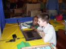 In the RARSfest Youth Lounge, two young hams work diligently at completing a General practice exam. [Andrea Hartlage, KG4IUM, Photo]