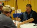 ARRL Assistant Administrative Manager for the Membership and Volunteer Programs Department Frankie Perez, KB1NQR, assists a ham with his DXCC application. [S. Khrystyne Keane, K1SFA, Photo]