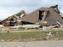 This home in Mena collapsed after the tornado came through the town on Friday, April 10. [Photo courtesy of National Weather Service, Little Rock]